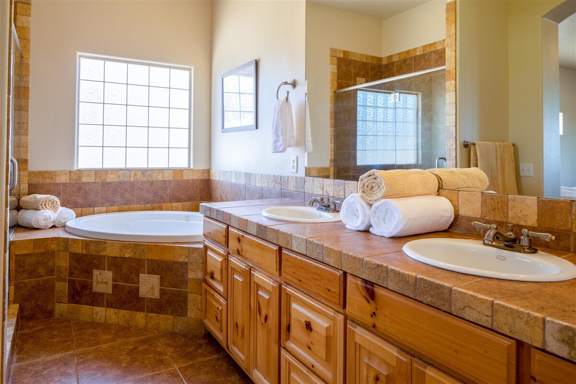 Master bedroom with soaking tub and stand up shower
