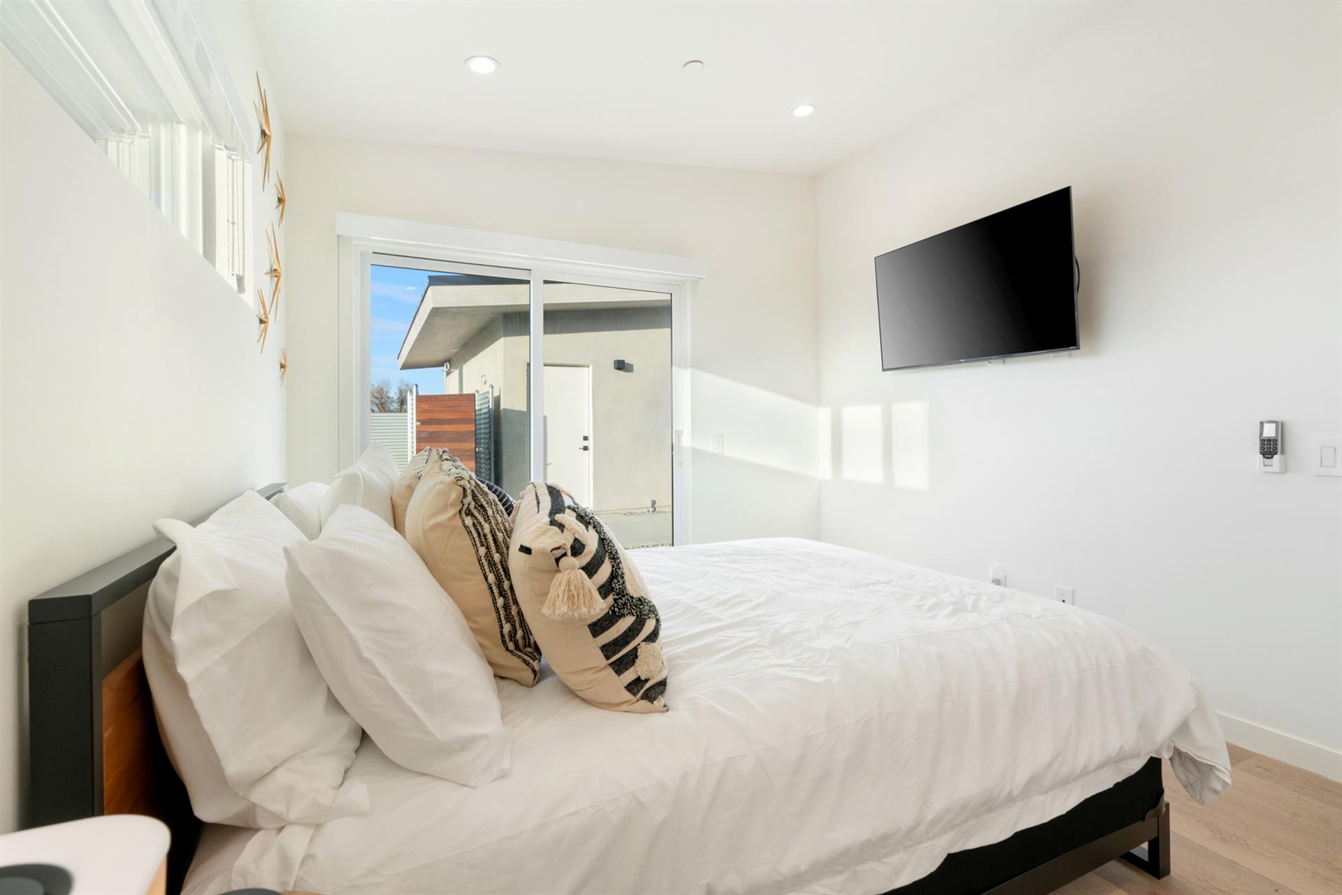 Bedrooms with flat screen TVs