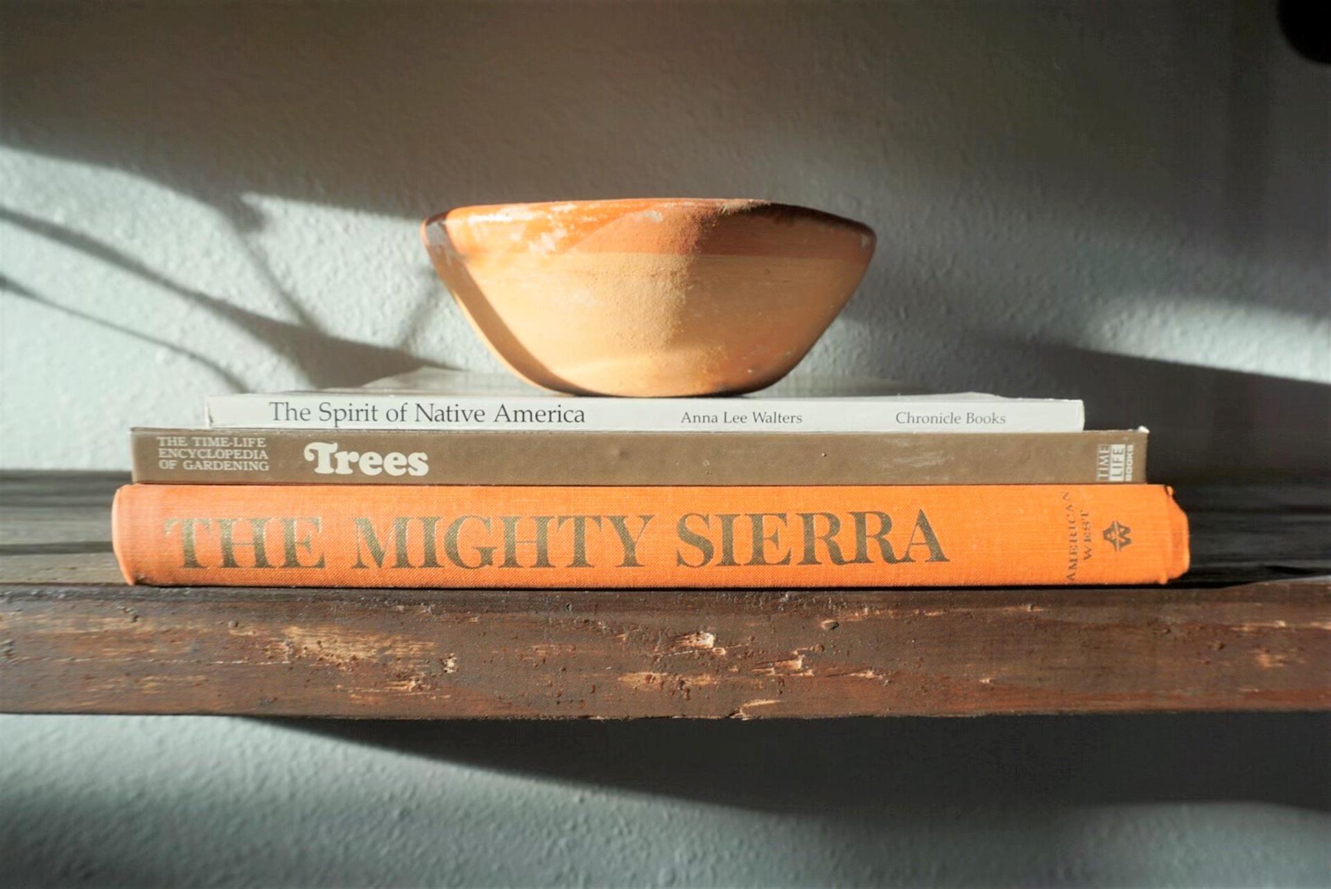 Curl up with a book of your own or read one from the vintage collection hand curated by Casa Amarilla