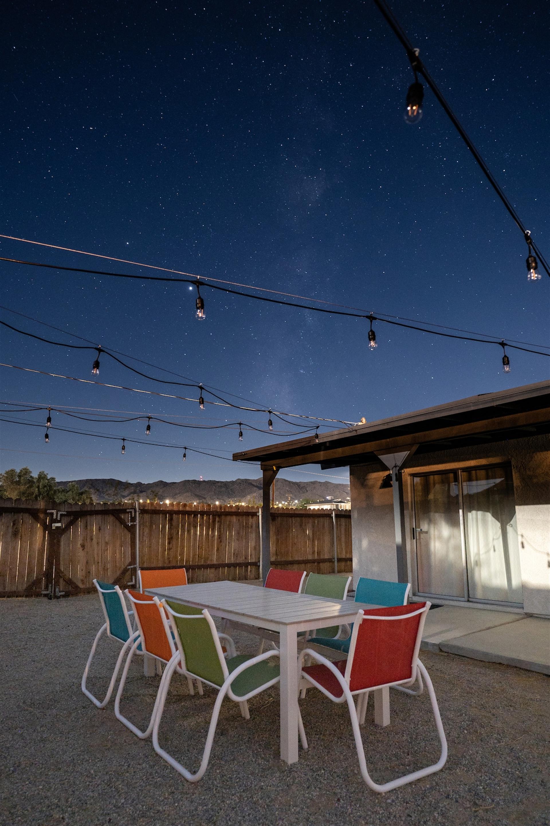 The Milky Way makes an appearance over the backyard. Turn off the bistro lights to enjoy the stars, even in the heart of JT village.