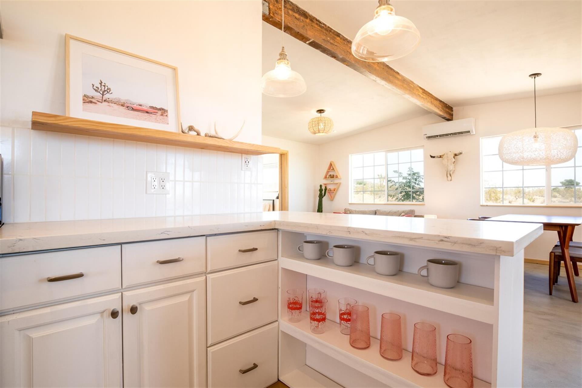 Builtin and open shelving throughout the kitchen.