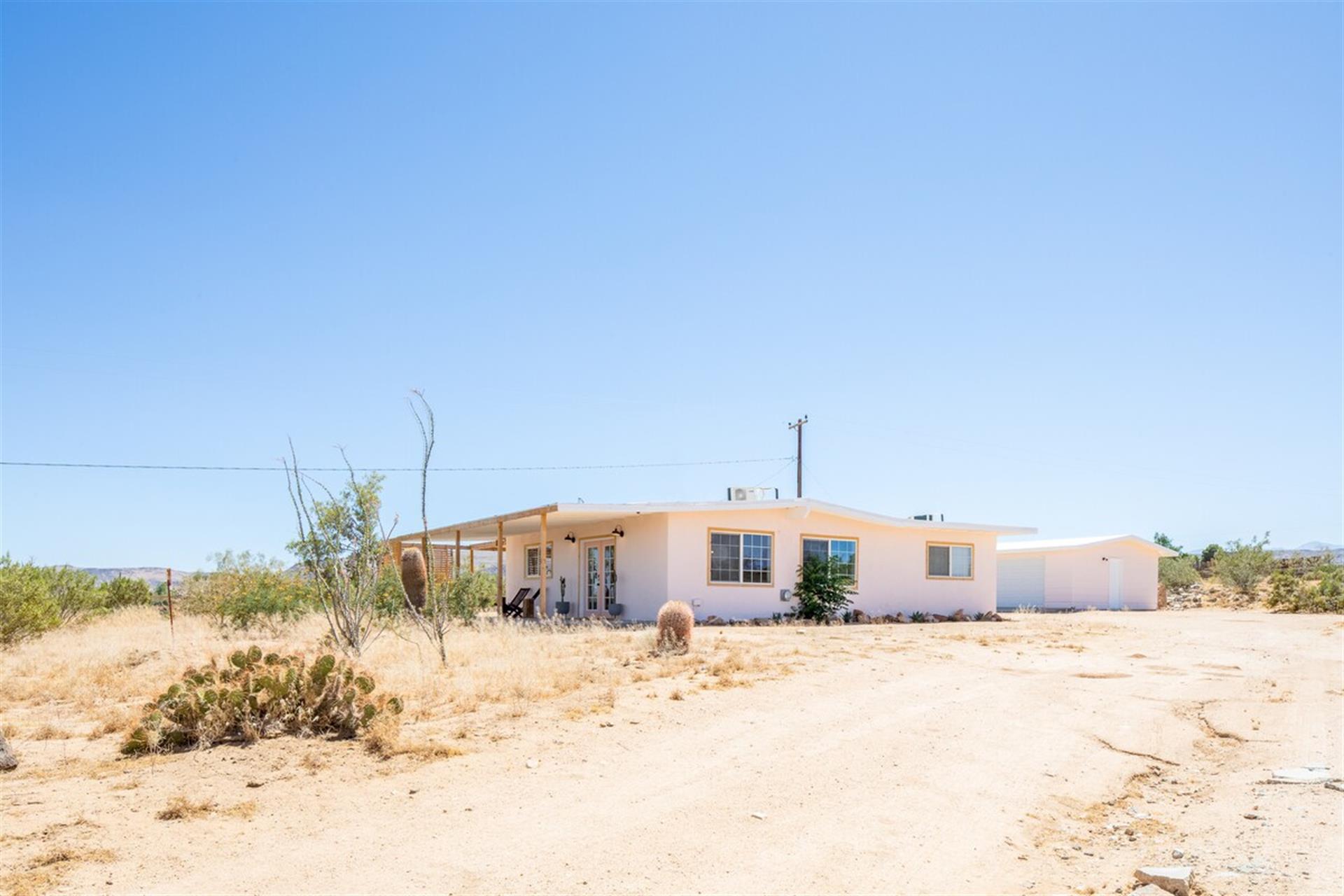 Side exterior view and desertscape