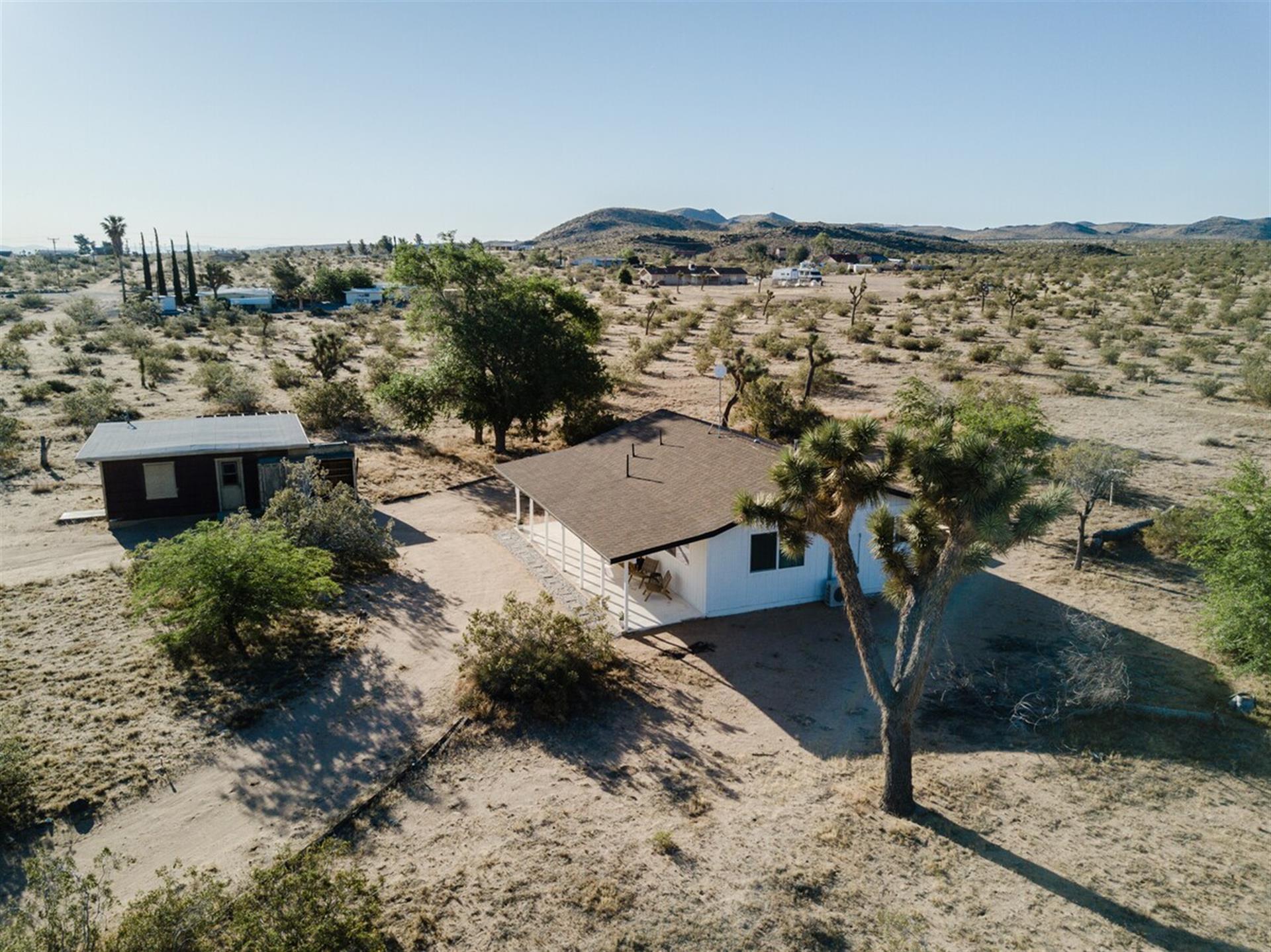 View of the home and shed used for owners supplies. No guest access to shed.