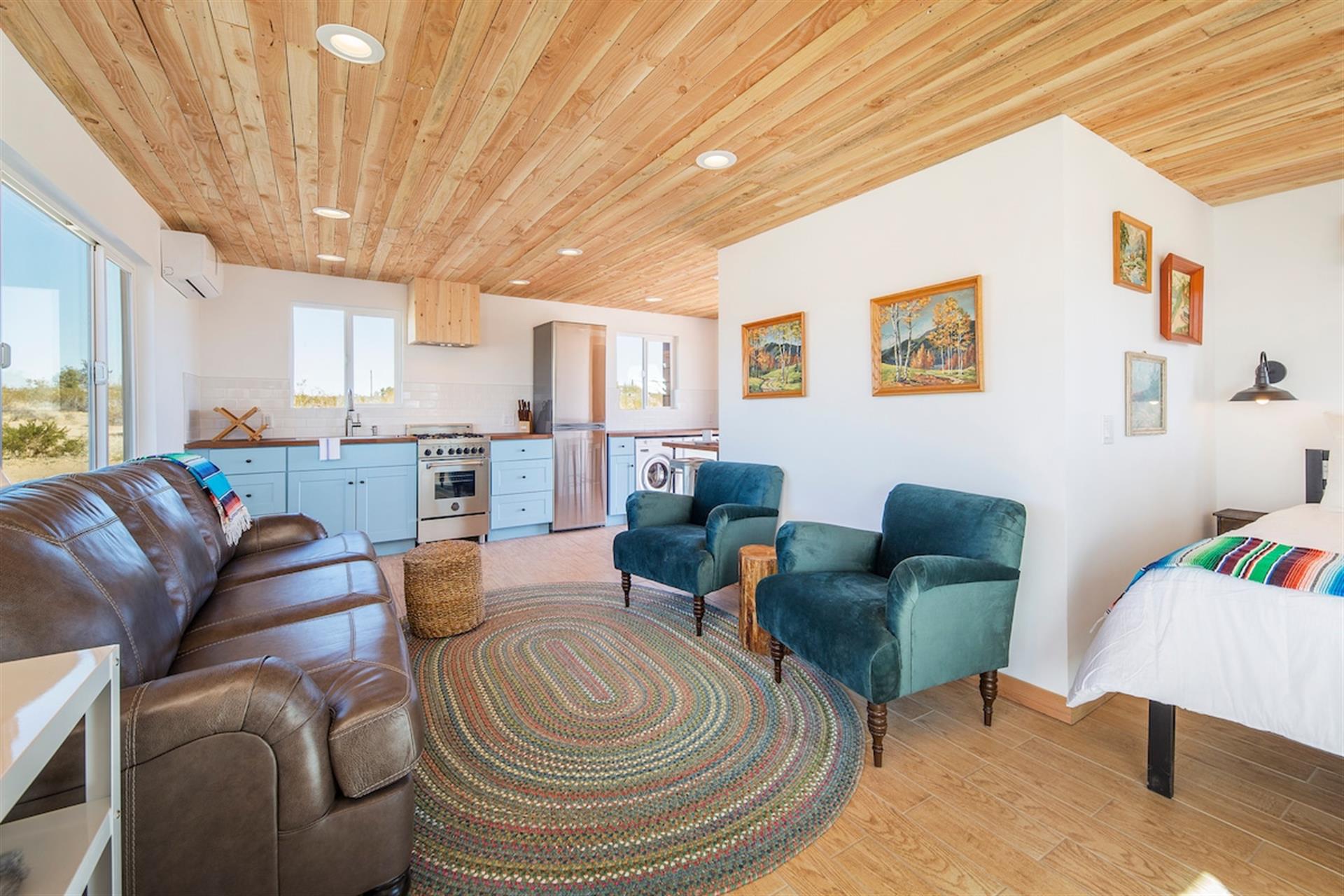 The living area can double as a second sleeping area. Just let us know so that we can provide extra bedding for the pull out queen sized couch