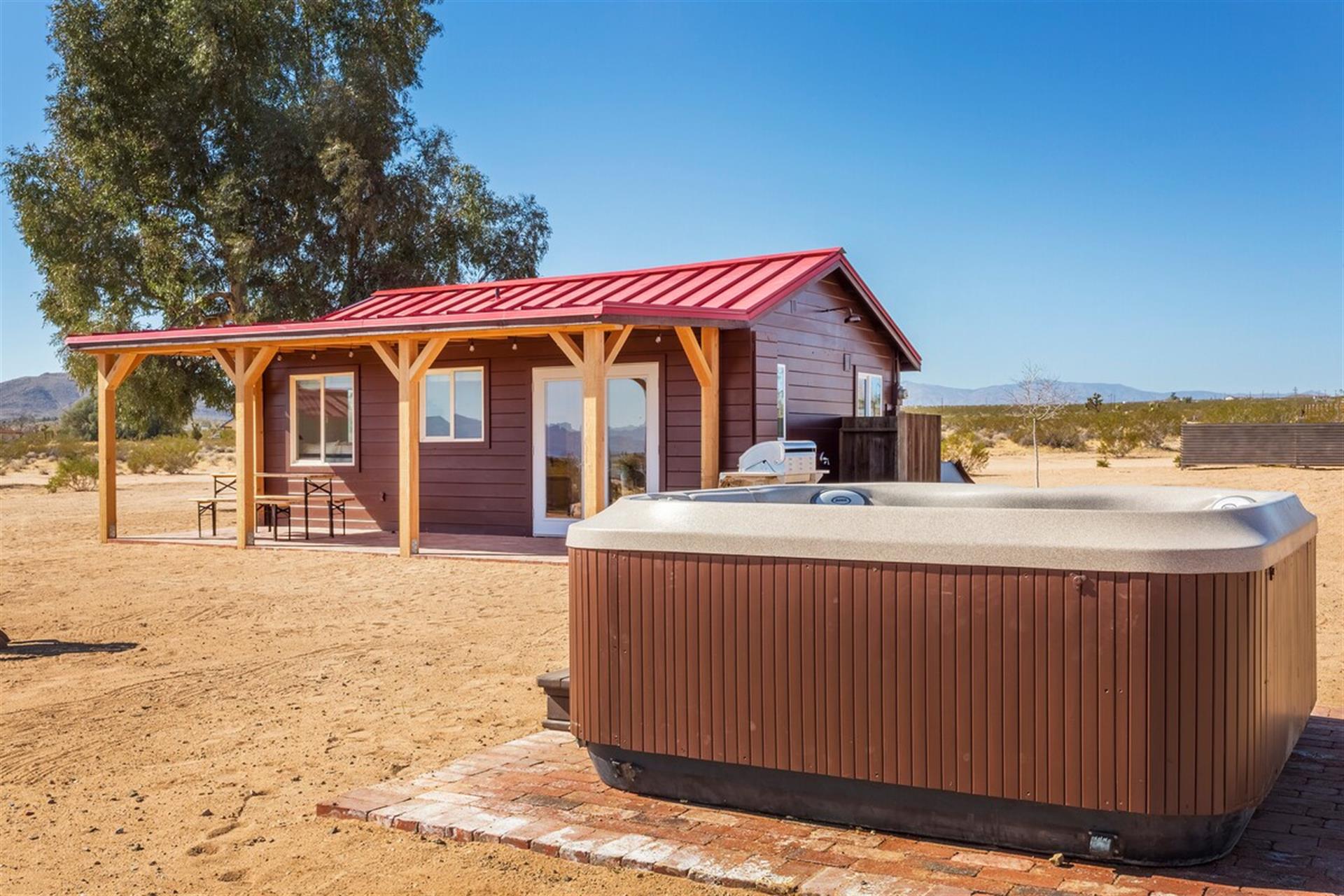 Youll love soaking under the stars in the four person Jacuzzi hot tub