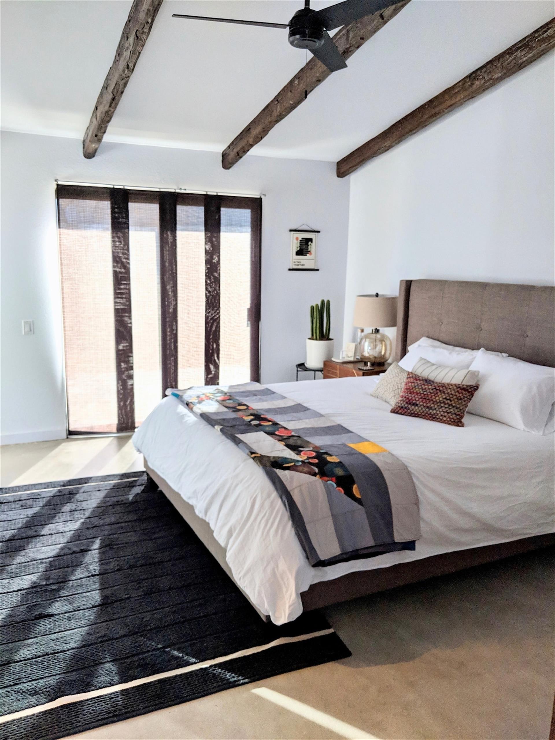 Master bedroom with king bed, walkin closet and private bathroom.