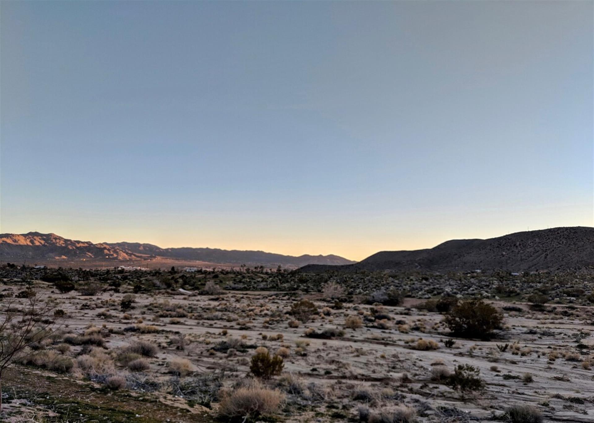 End of day view from the  edge of the yard. The property is on 12 acre.