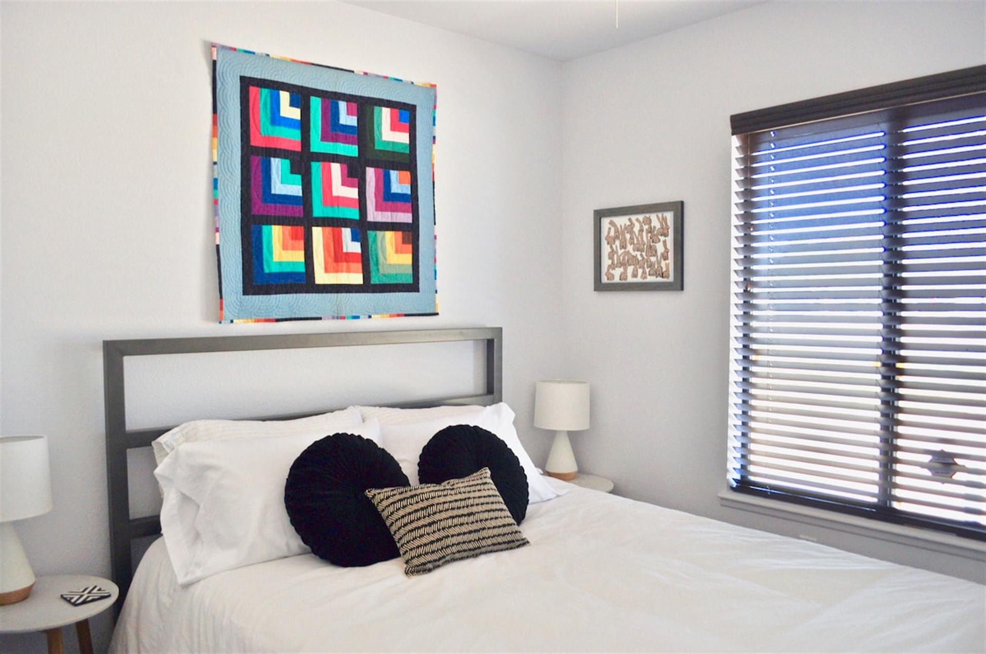 Bedroom 3 is the smallest of the three bedrooms and has a closet with two luggage racks.
