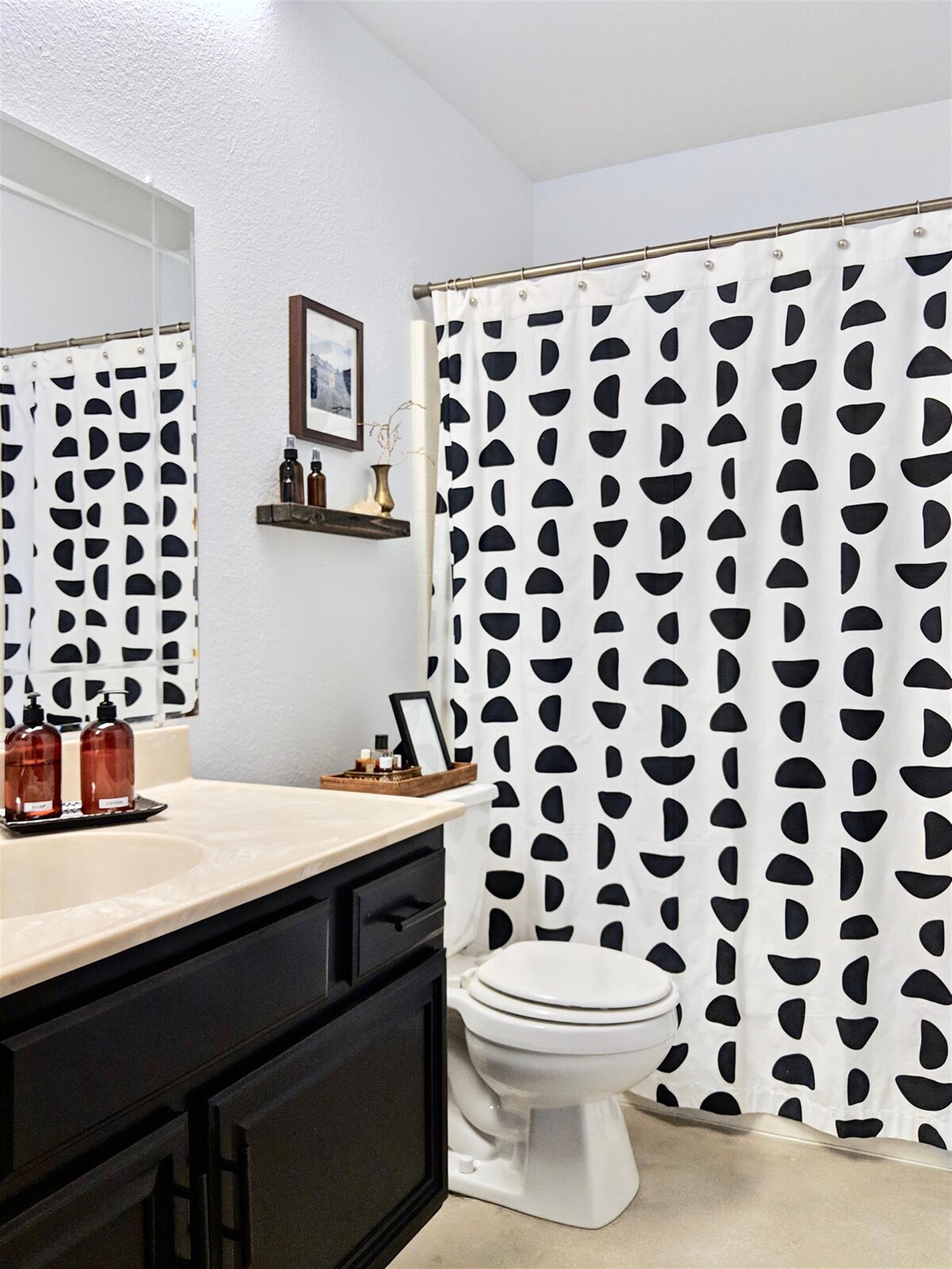 Guest Bathroom. All natural EO brand bath products provided in both bathrooms. This bathroom is shared by guests staying in room 2 and 3.