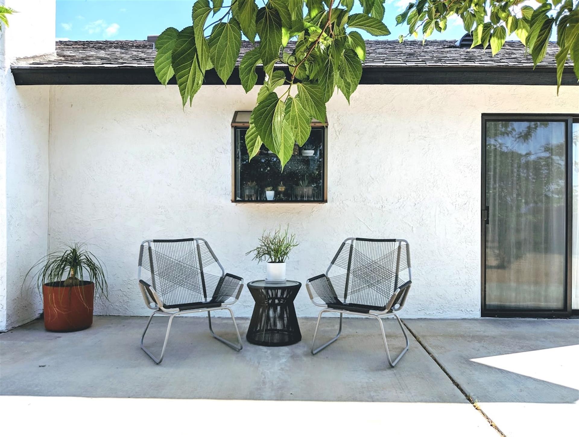Back patio a work in progress conversation spot.