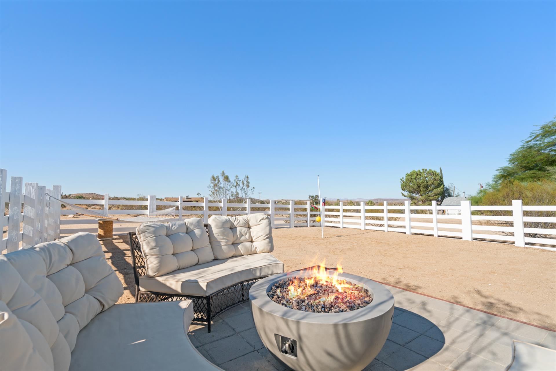 outdoor fire pit with hammock station