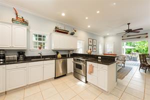 Gourmet kitchen with stainless steel appliances.