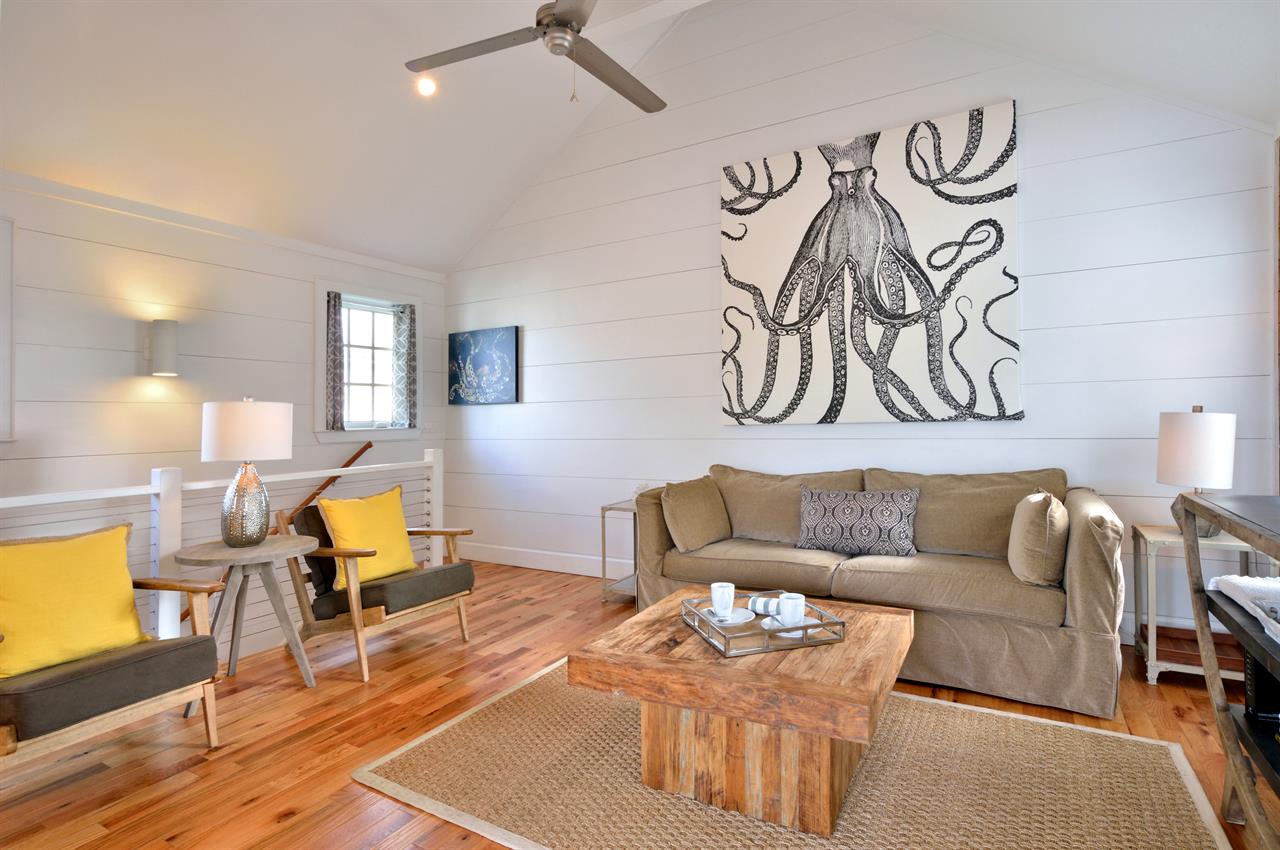 Large open concept living area with magnificent art.