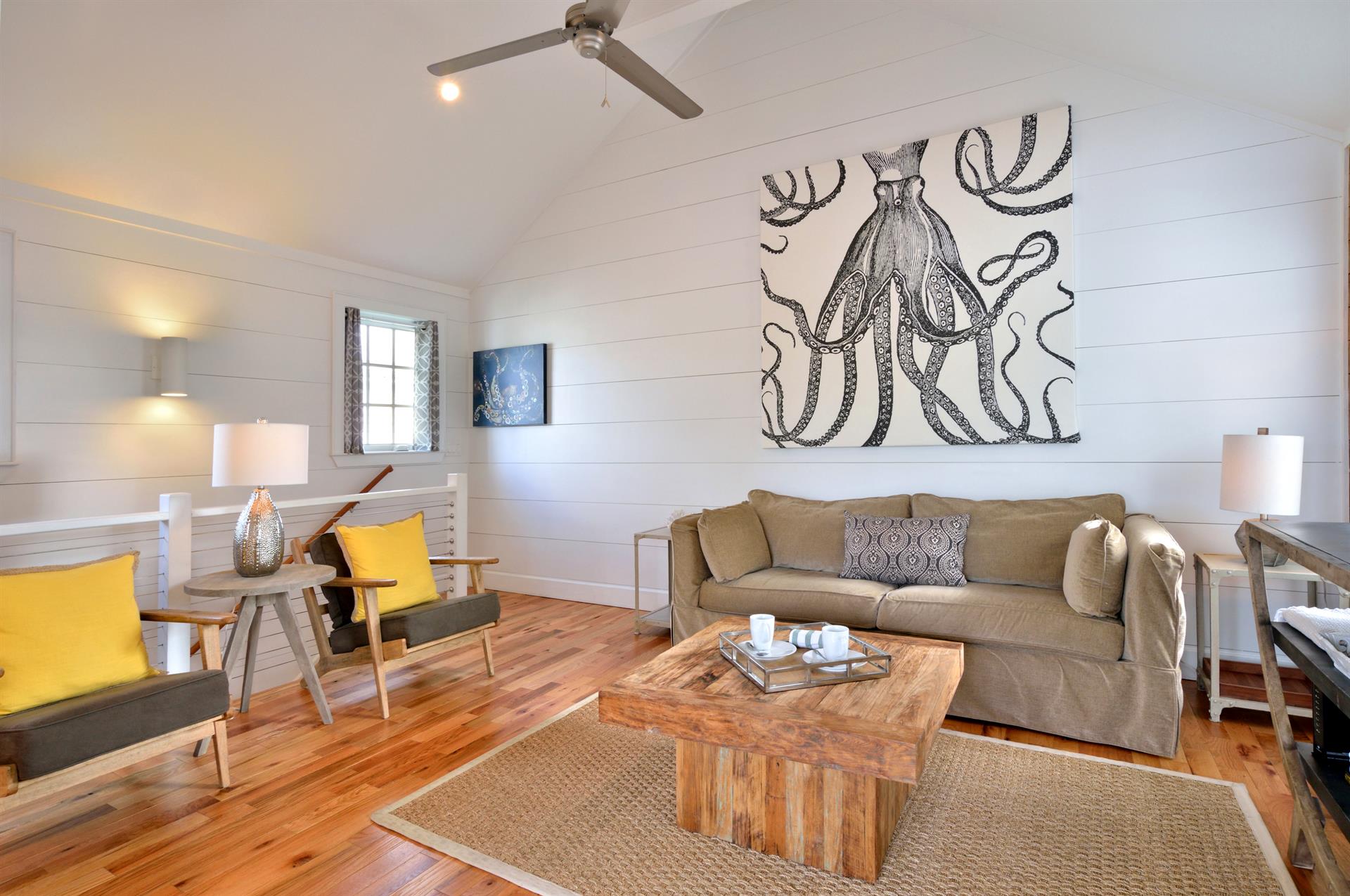 Large open concept living area with magnificent art.