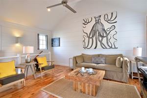 Large open concept living area with magnificent art.