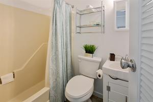 Upstairs ensuite bathroom with tubshower combo.