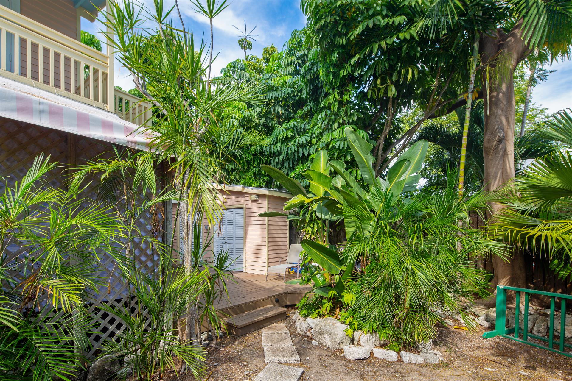 Lush landscaping is shared by both apartments.
