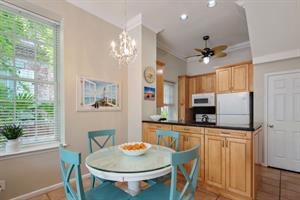 Dining area offers super cute seating for 4.