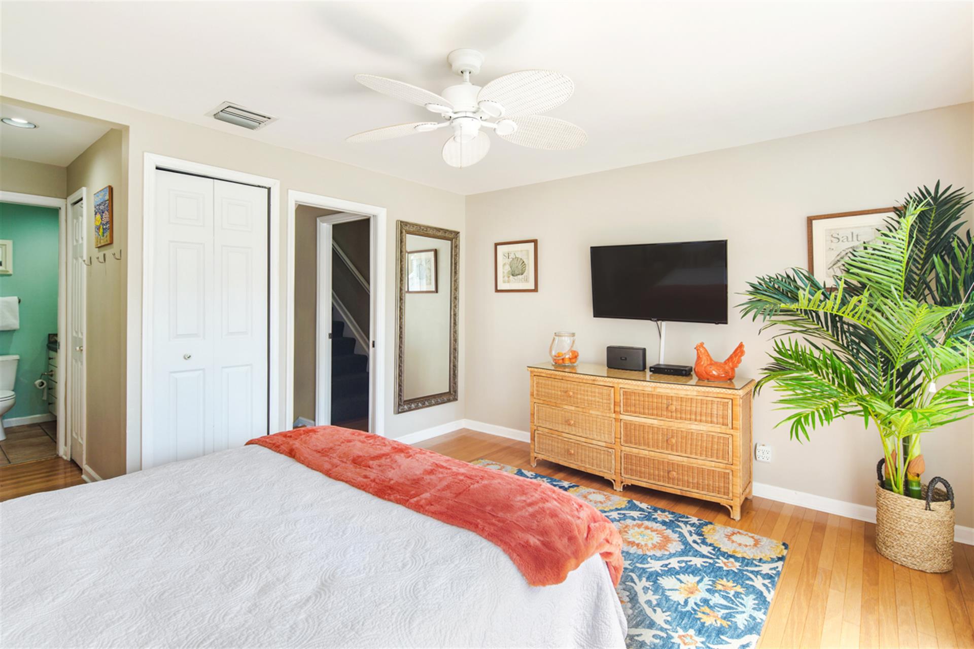 Primary includes dresser, ensuite, full length mirror, large TV.