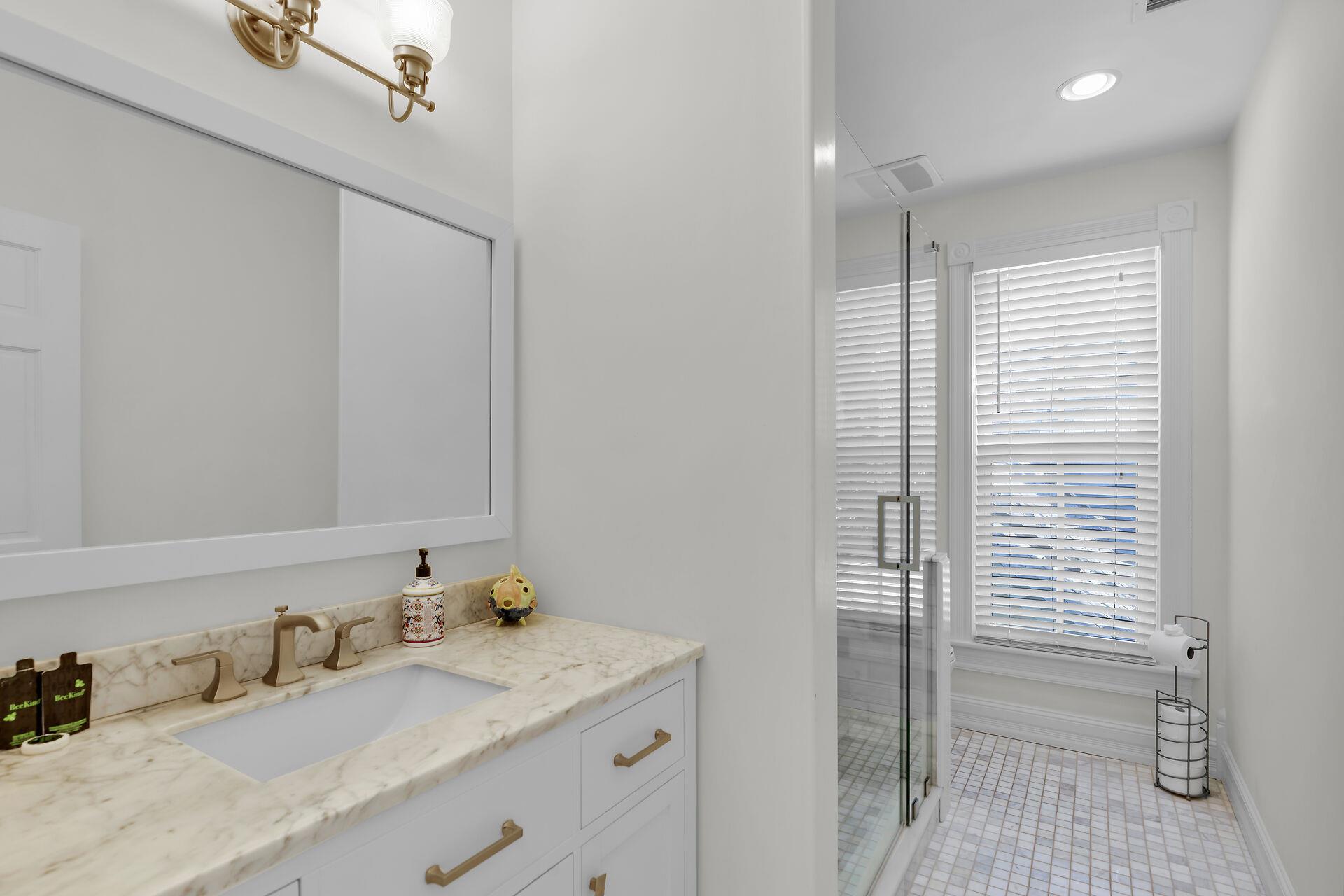 Primary bedroom has modern ensuite bath