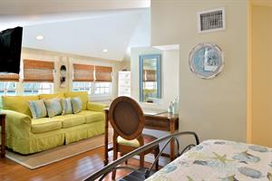 Extra seating or lounging area in primary bedroom.