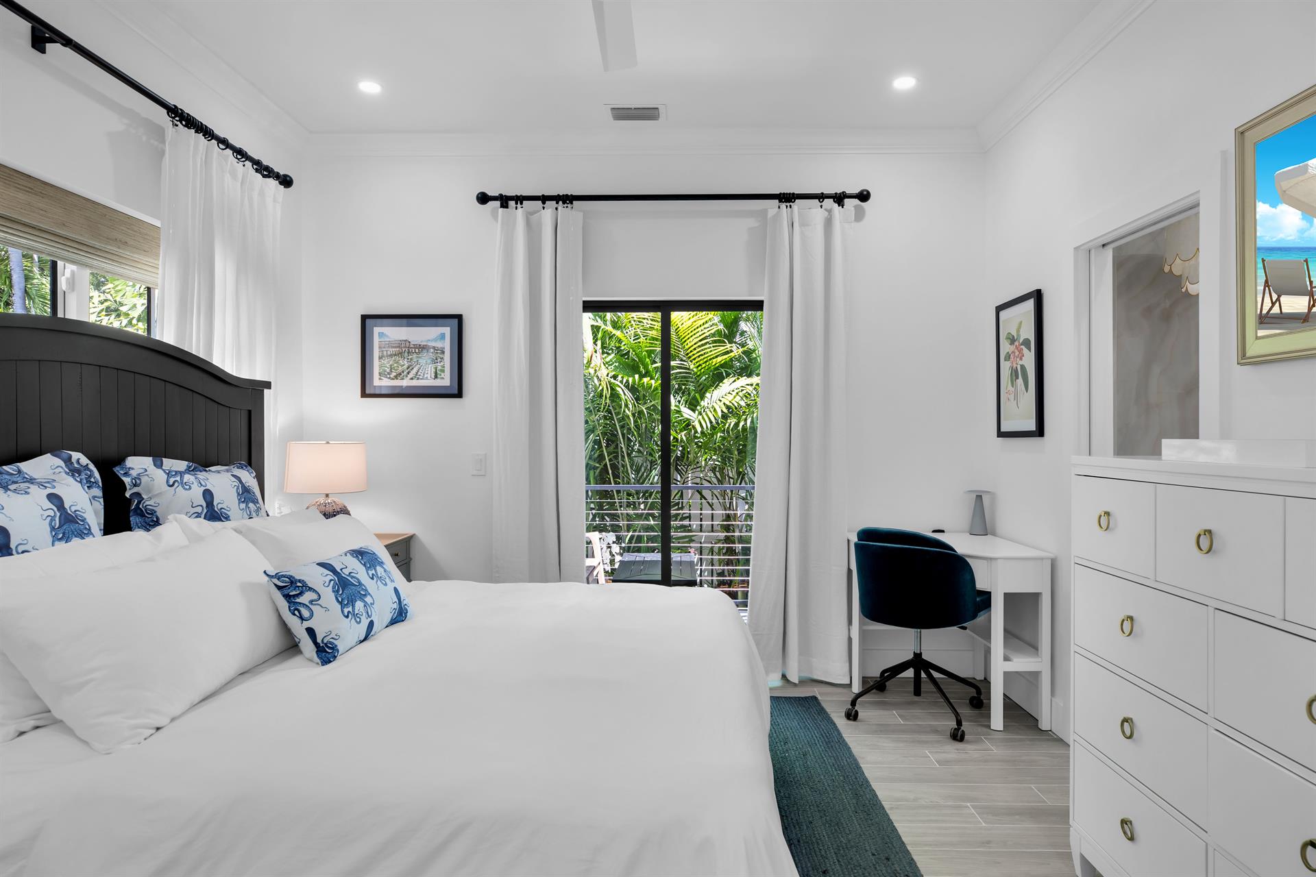 Primary has dresser, desk, and access to your private deck