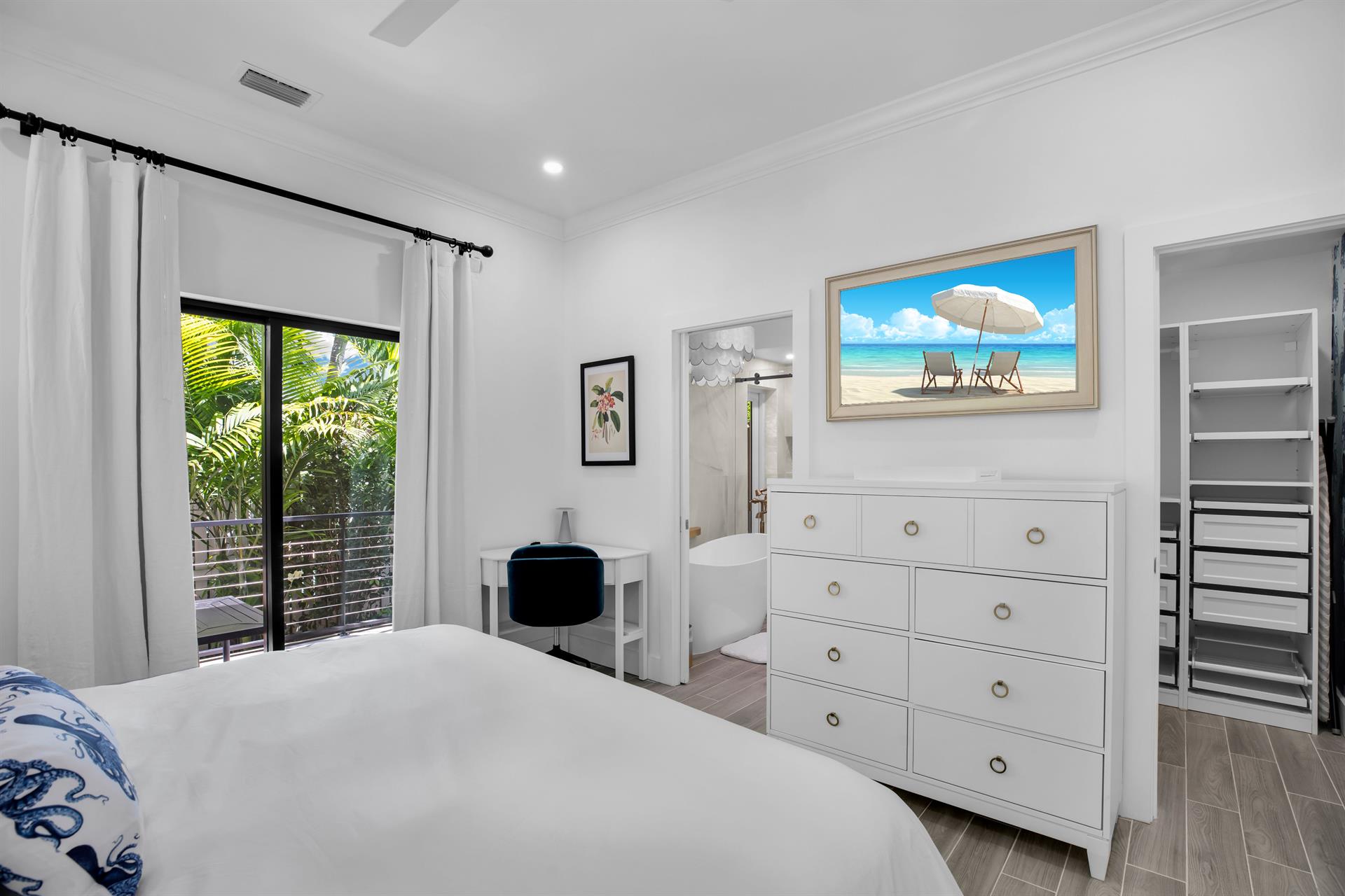 Ensuite bath and walkin closet complete the primary.