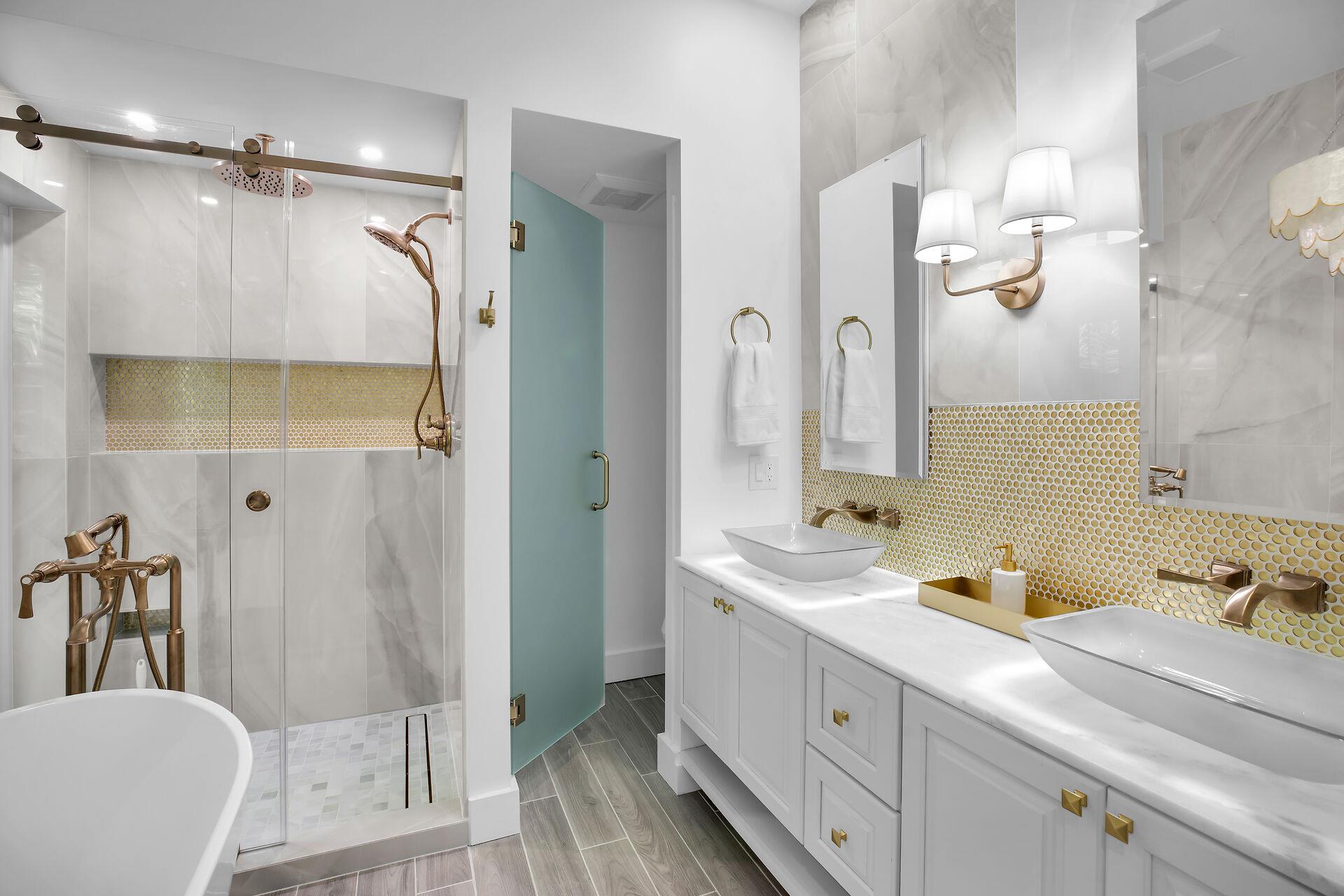 What an exquisite primary bath with tub and walk in shower.