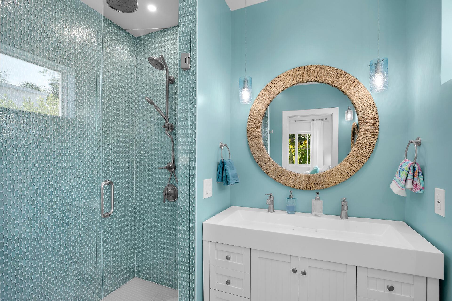 Guest ensuite with fabulous blue tile shower