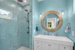 Guest ensuite with fabulous blue tile shower