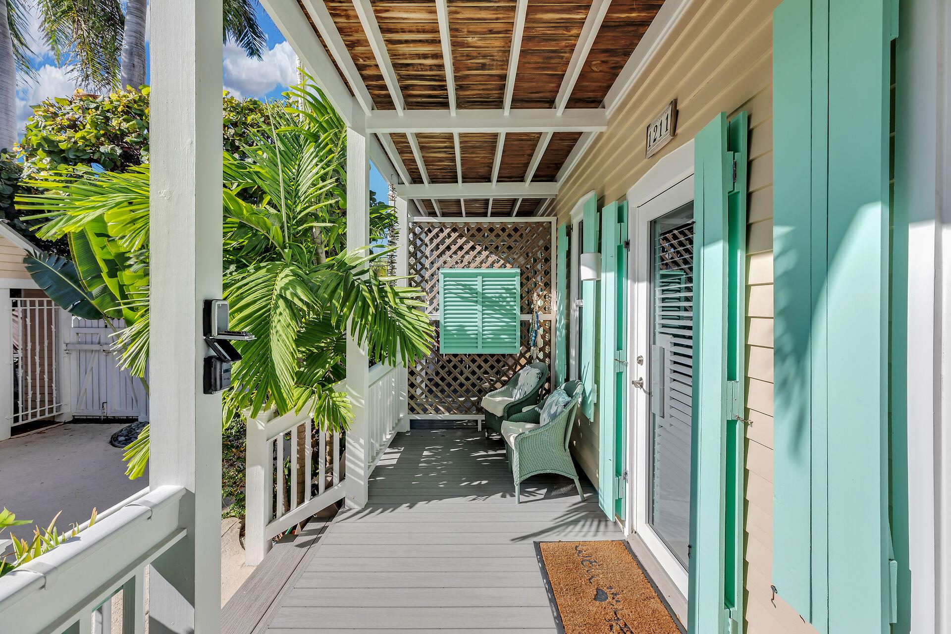 Sit back with a beverage, looking out at the courtyard.