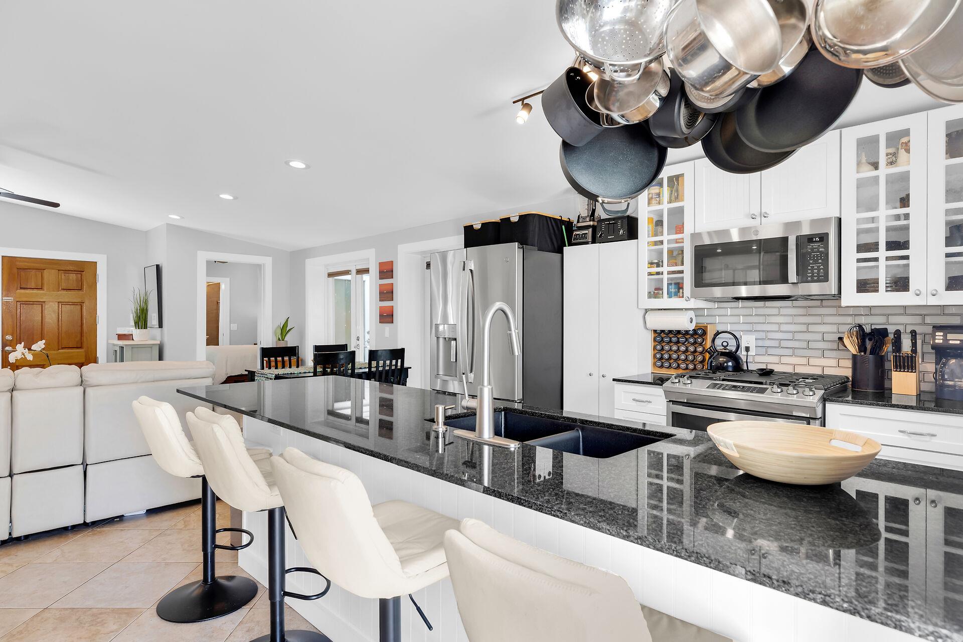Kitchen island with sink and seating
