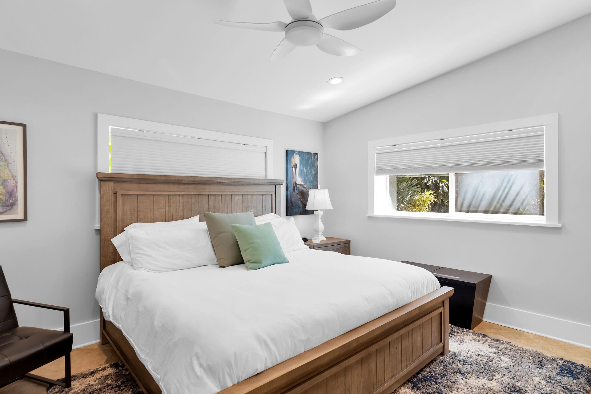 King guest bedroom with plenty of natural light