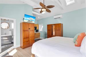 Guest house has king bed, ensuite bath and kitchenette.