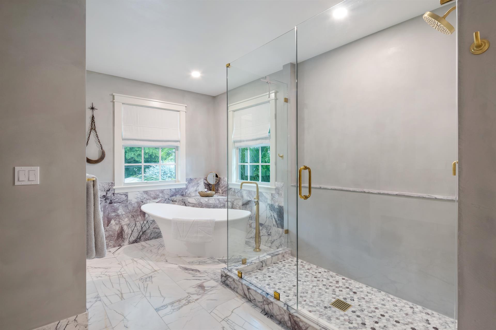 Oversized glass walkin shower with large soaking tub