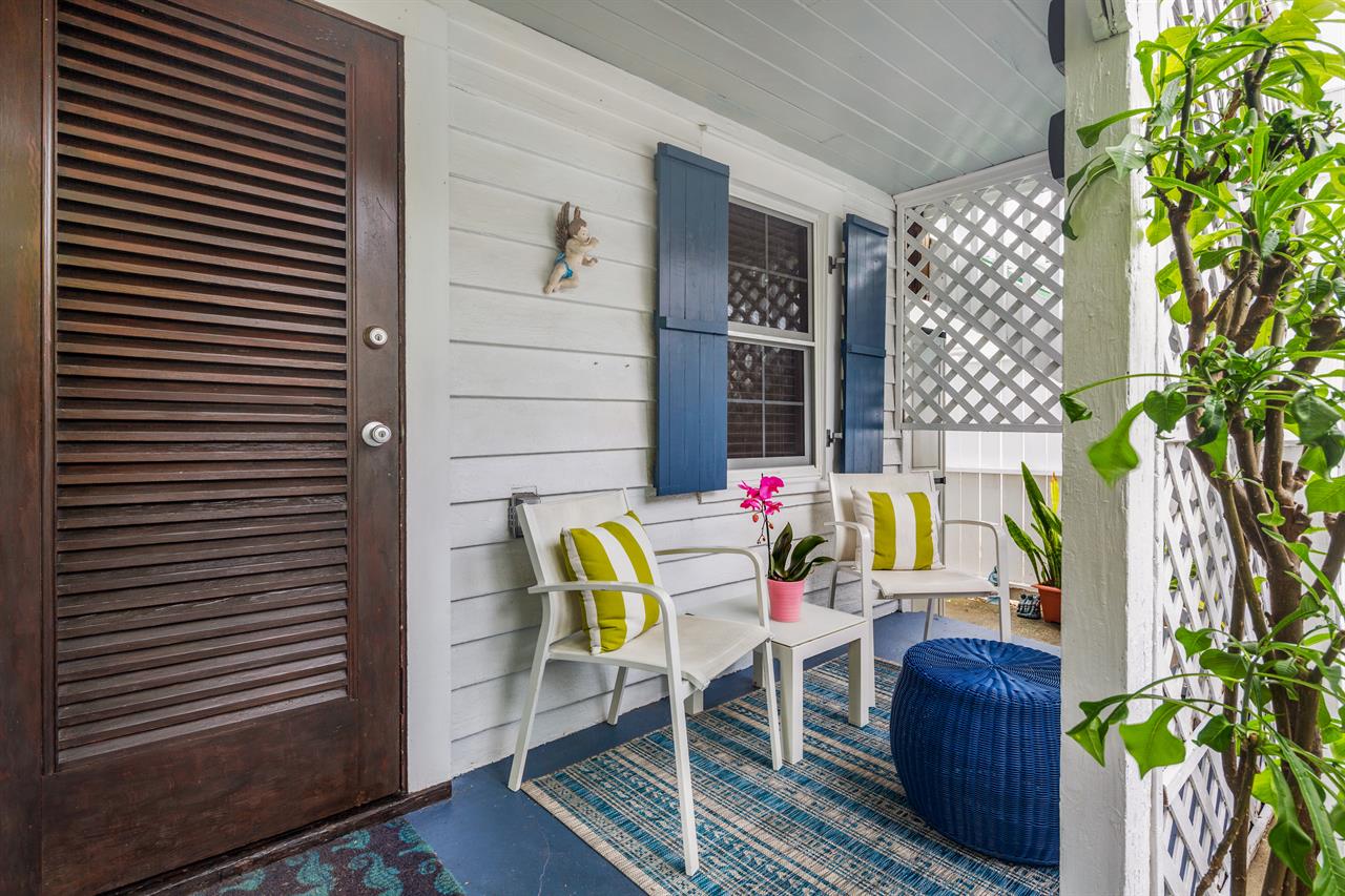 Imagine listening to the birds on this charming porch.