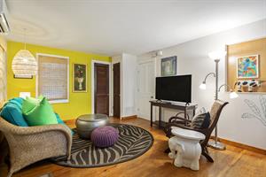 Kick back and relax in this colorful living room.