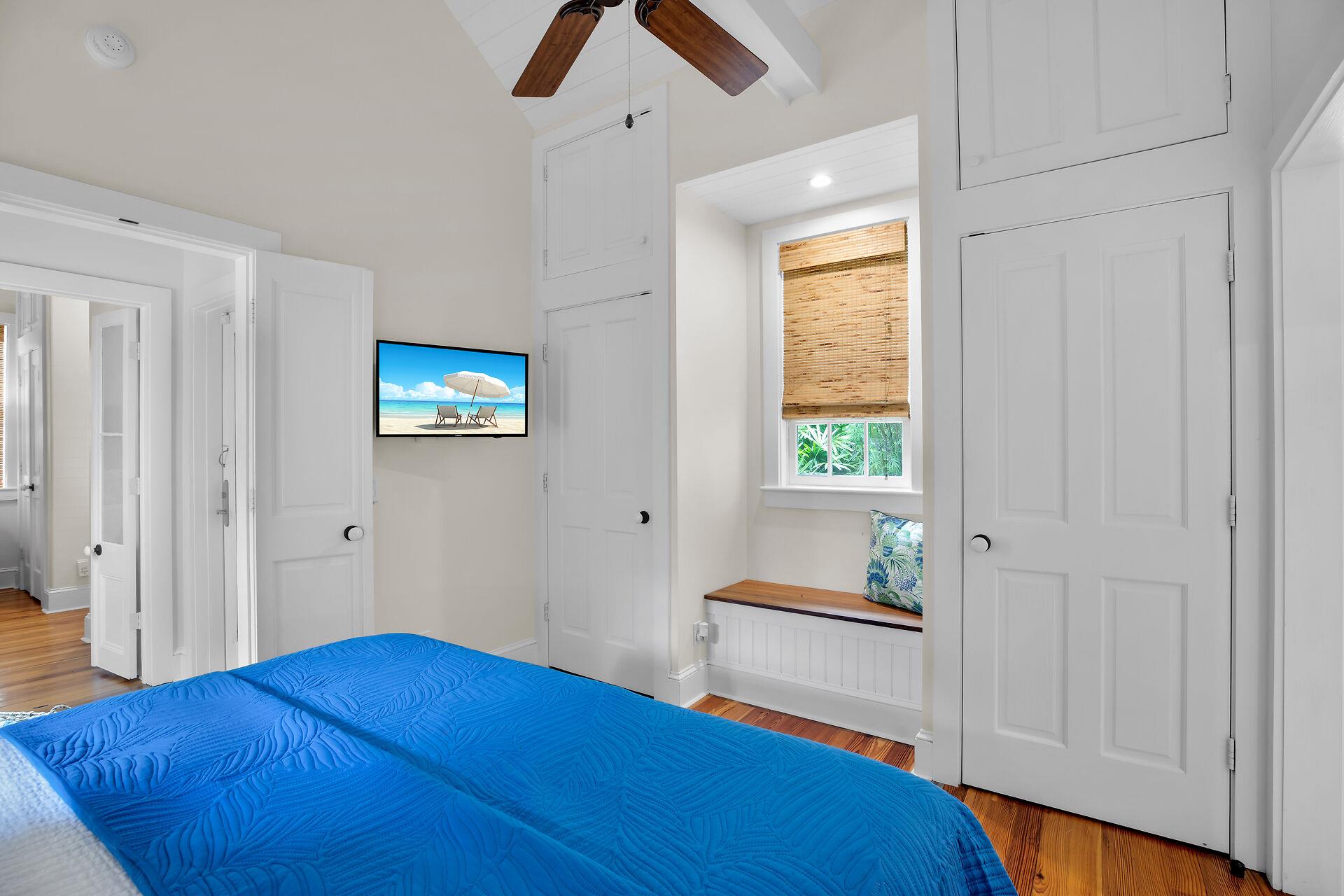 Two closets, a TV and window seat in primary.