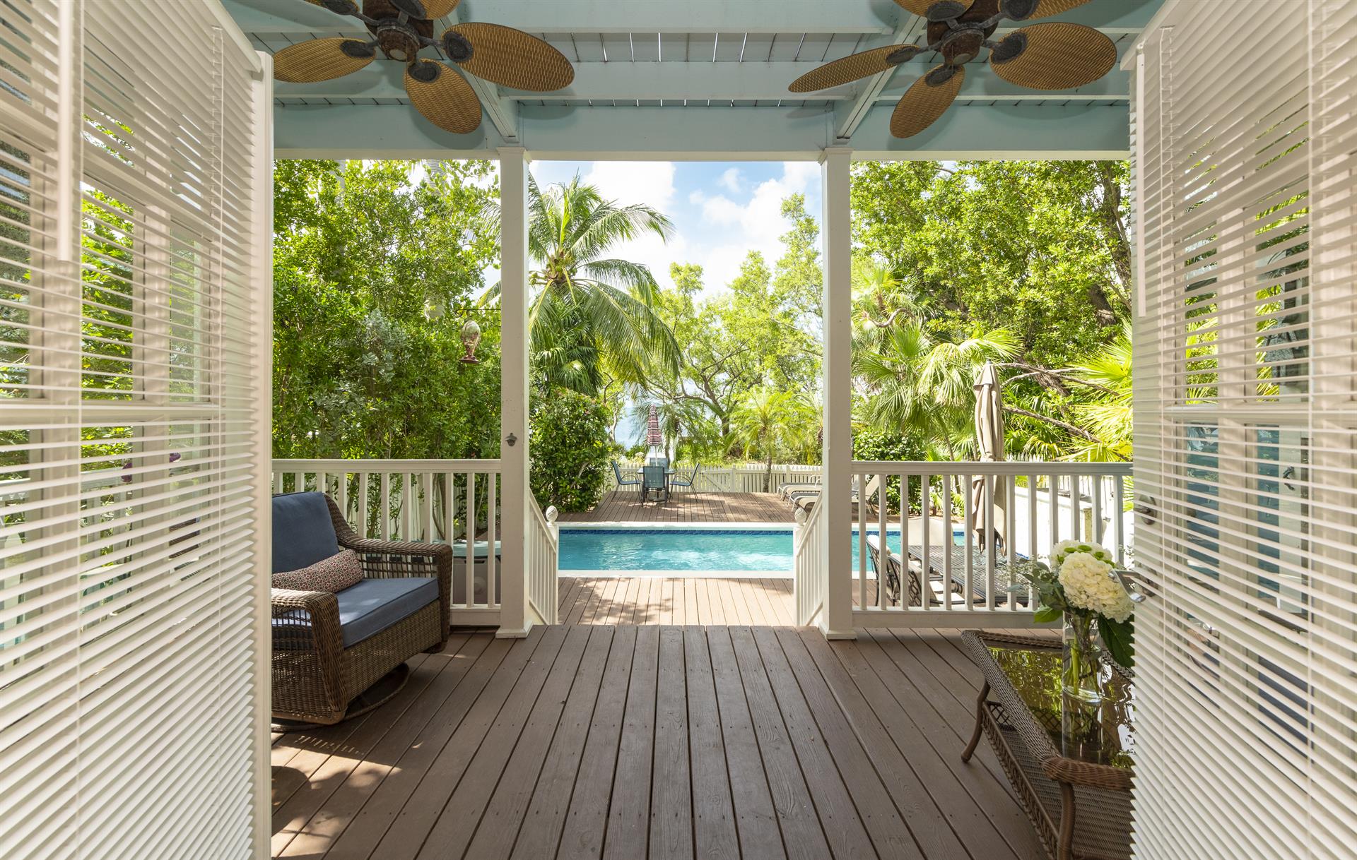 Sweeping doors open wide to the spacious porch.