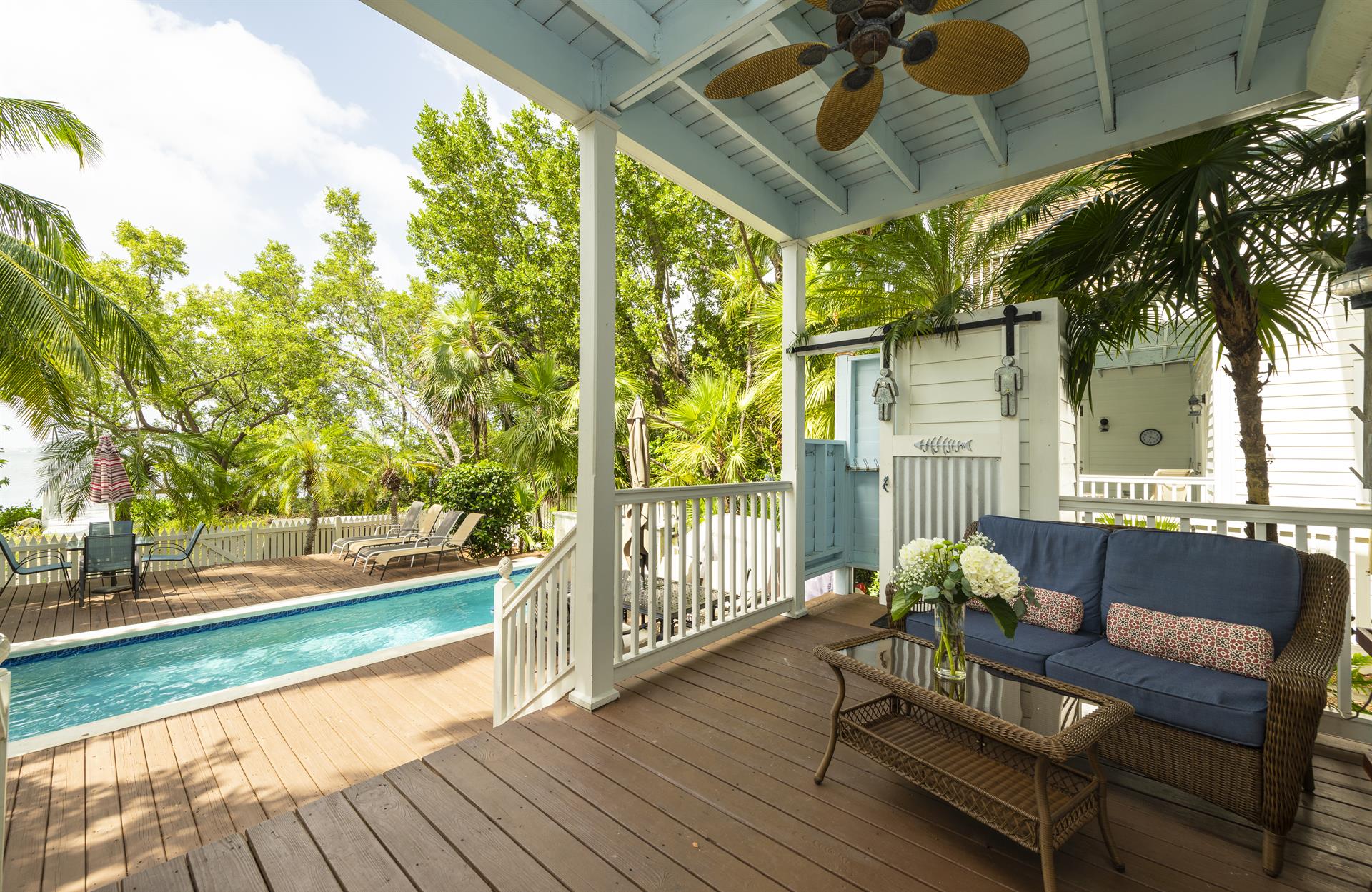 Enjoy Gulf breezes from the covered porch.