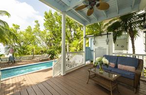 Enjoy Gulf breezes from the covered porch.