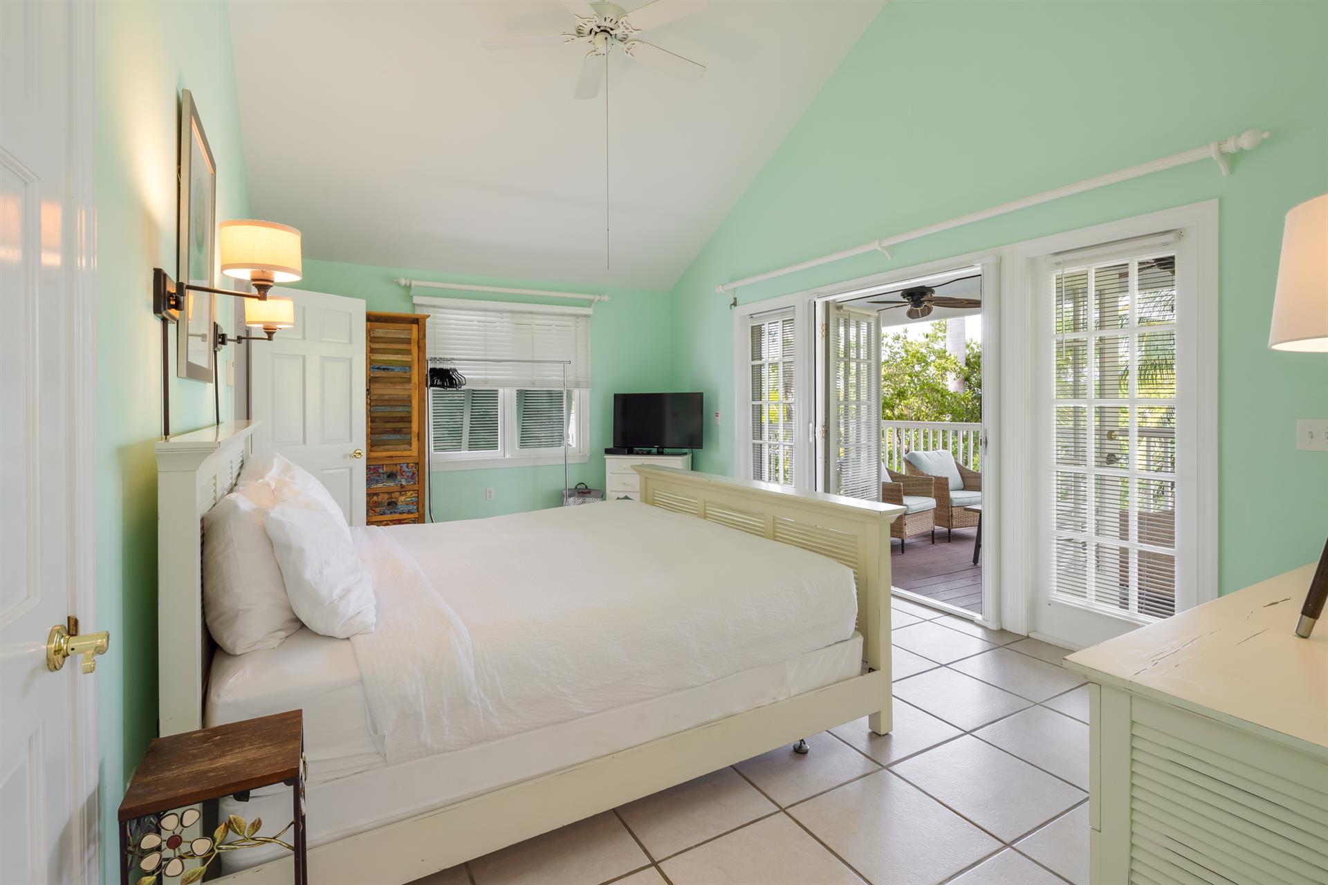 King primary suite has balcony access.