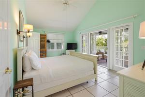 King primary suite has balcony access.