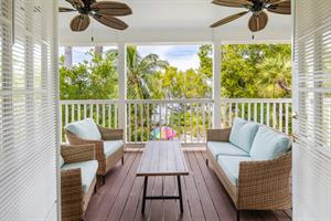 Enjoy your morning coffee on the private rear balcony.