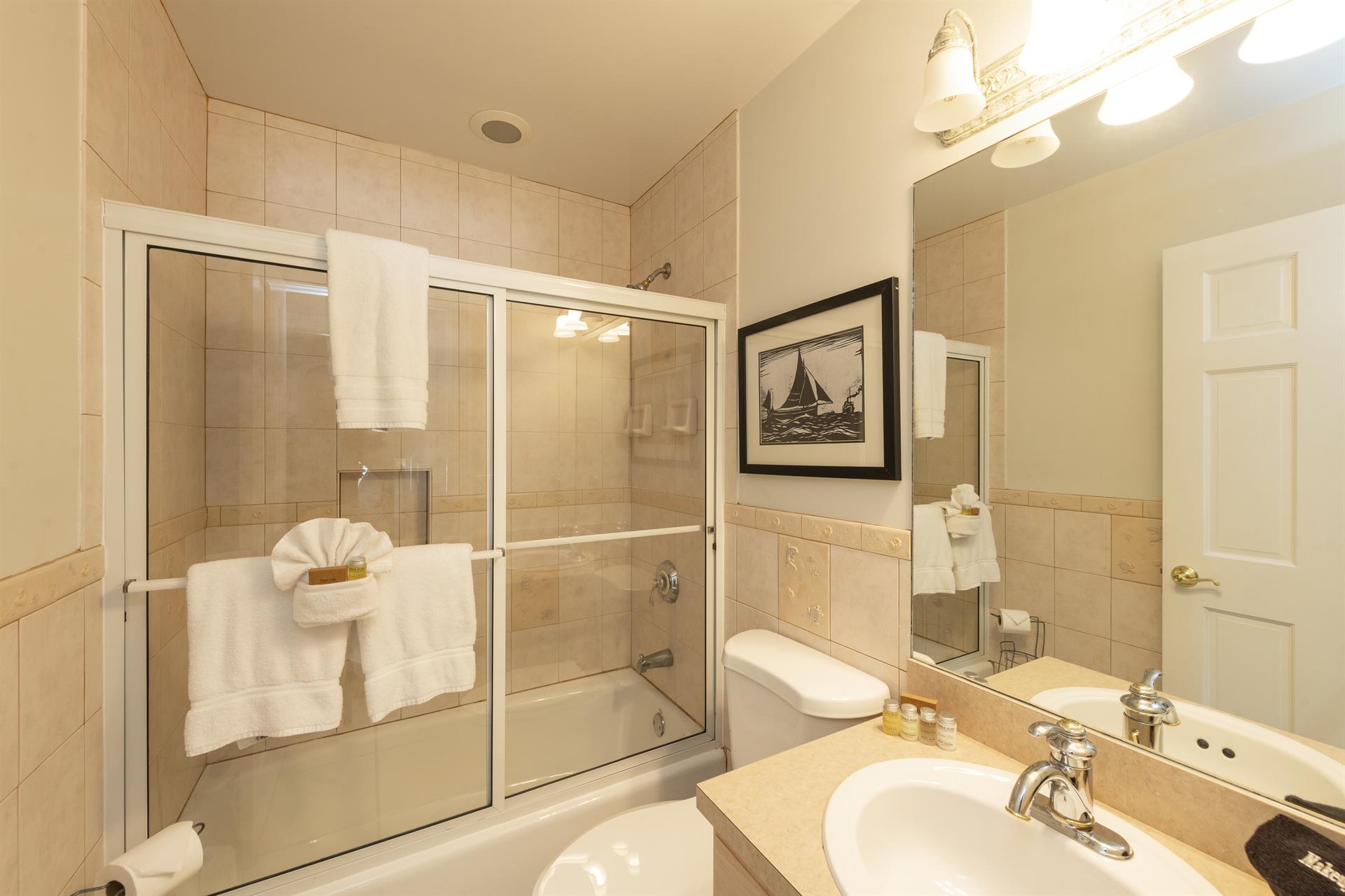 A full hall bathroom includes a showertub combo.
