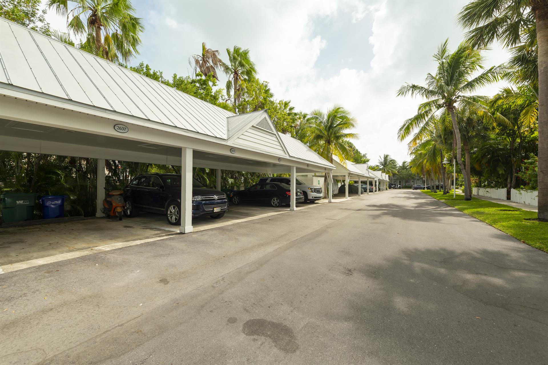 Dedicated covered parking spot for one vehicle.