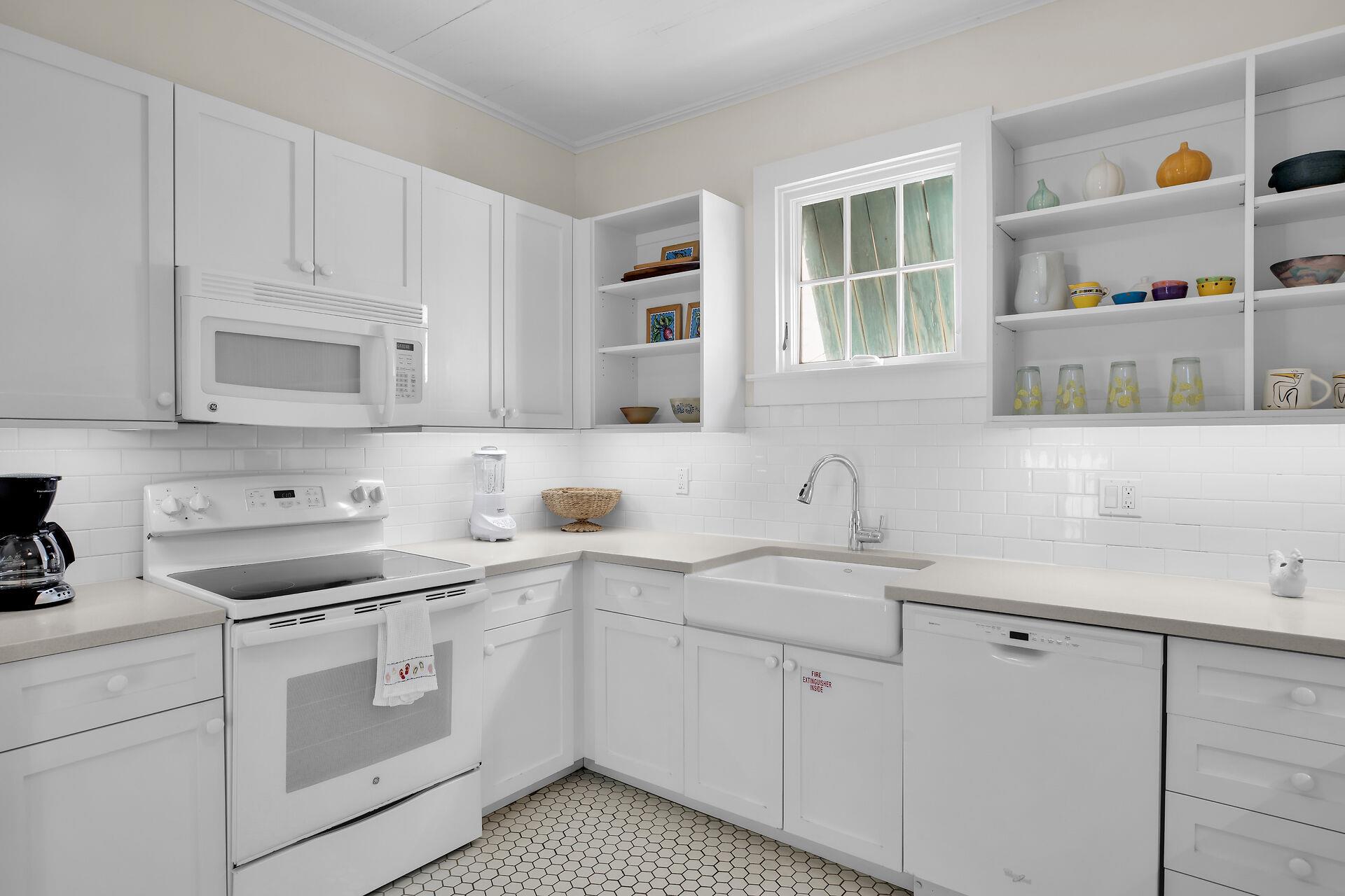 Bright, clean kitchen for meal or snack pep.