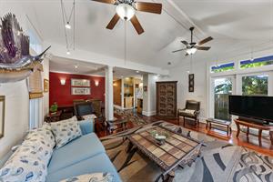 Stylish living room with  furnishings and flat screen TV.