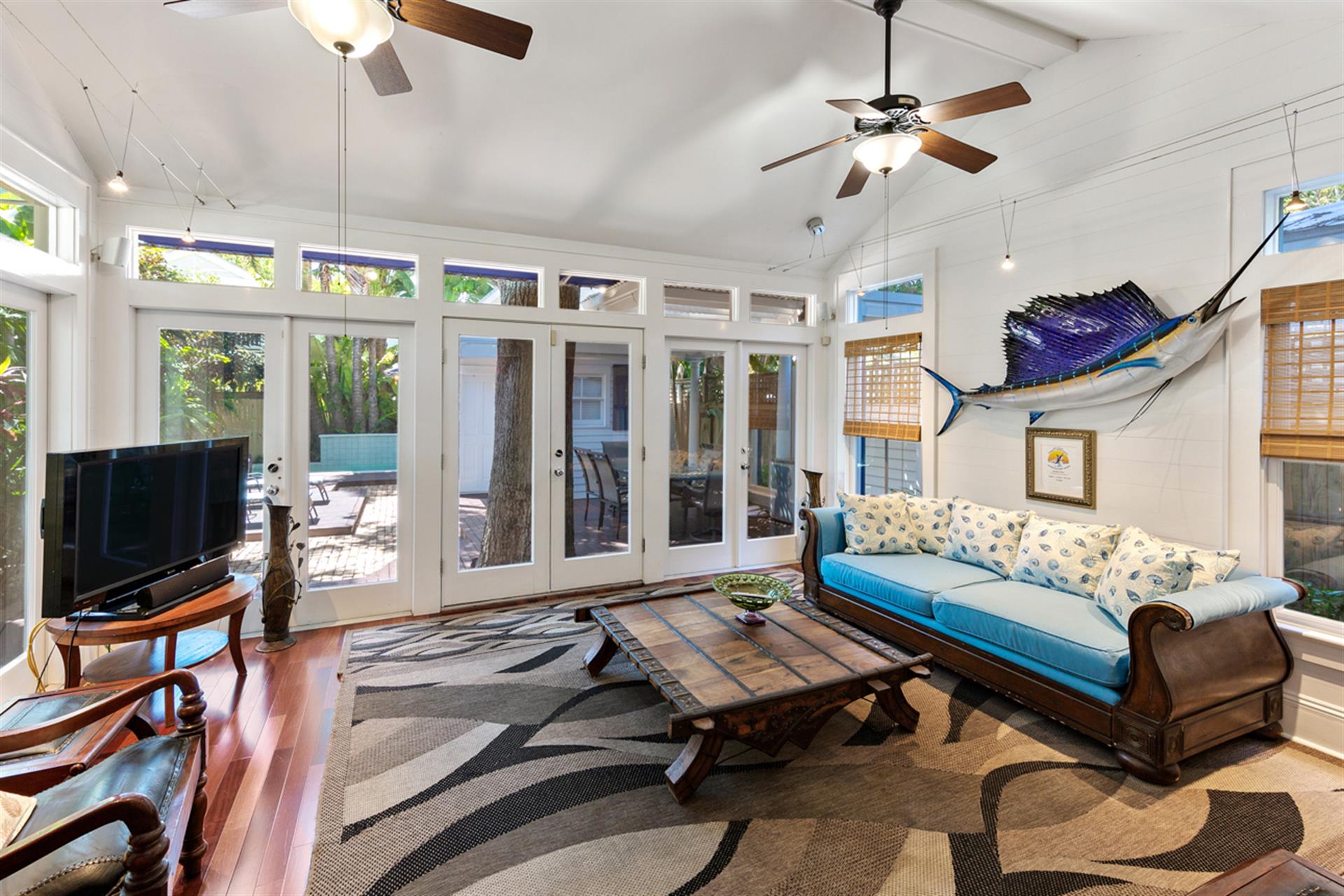 The wall of glass doors provides abundant natural light.