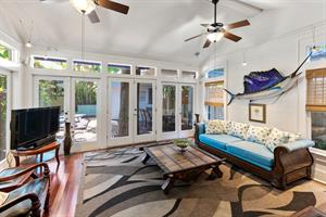 The wall of glass doors provides abundant natural light.